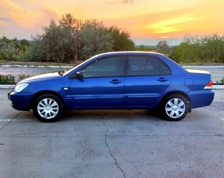 Синий Мицубиси Лансер, объемом двигателя 1.6 л и пробегом 0 тыс. км за 3500 $, фото 2 на Automoto.ua