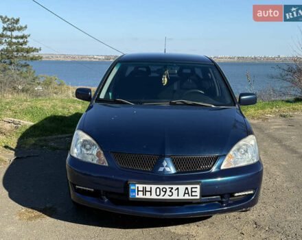 Синій Міцубісі Lancer, об'ємом двигуна 1.58 л та пробігом 269 тис. км за 3350 $, фото 1 на Automoto.ua