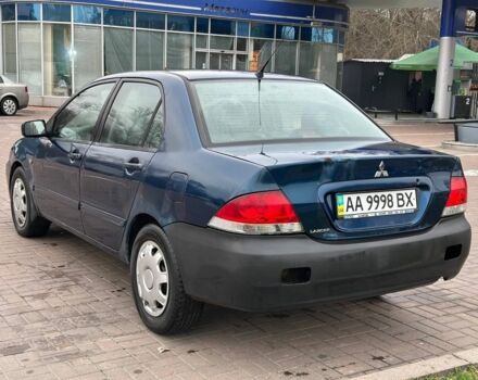 Синий Мицубиси Лансер, объемом двигателя 1.6 л и пробегом 260 тыс. км за 2300 $, фото 2 на Automoto.ua