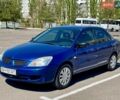 Синий Мицубиси Лансер, объемом двигателя 1.6 л и пробегом 268 тыс. км за 3400 $, фото 1 на Automoto.ua