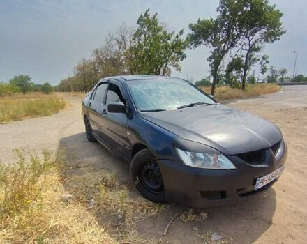 Синий Мицубиси Лансер, объемом двигателя 1.6 л и пробегом 360 тыс. км за 3000 $, фото 3 на Automoto.ua