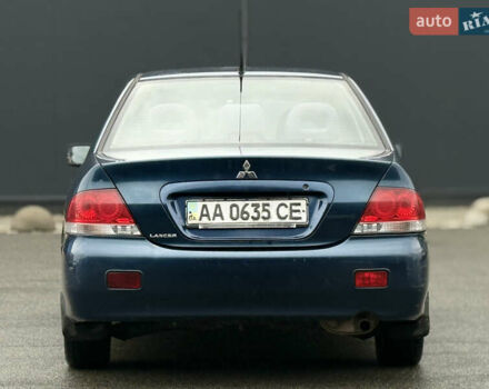 Синій Міцубісі Lancer, об'ємом двигуна 1.58 л та пробігом 513 тис. км за 2500 $, фото 14 на Automoto.ua