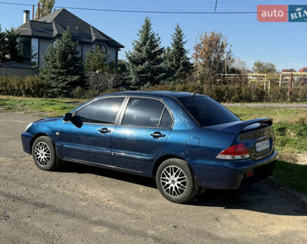 Синій Міцубісі Lancer, об'ємом двигуна 1.58 л та пробігом 269 тис. км за 3350 $, фото 5 на Automoto.ua