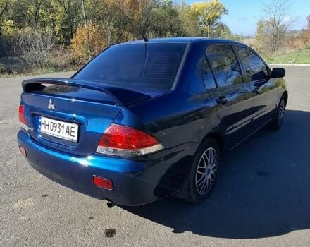 Синій Міцубісі Lancer, об'ємом двигуна 1.6 л та пробігом 267 тис. км за 3700 $, фото 6 на Automoto.ua