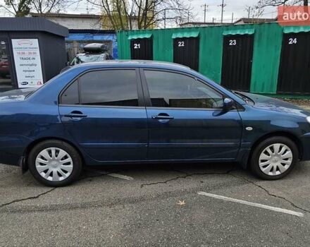 Синий Мицубиси Лансер, объемом двигателя 1.62 л и пробегом 114 тыс. км за 5200 $, фото 4 на Automoto.ua