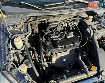 Синій Міцубісі Lancer, об'ємом двигуна 1.58 л та пробігом 269 тис. км за 3350 $, фото 25 на Automoto.ua