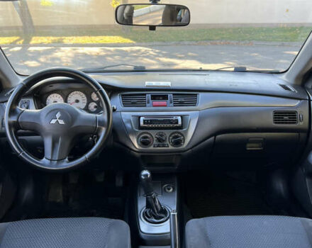 Міцубісі Lancer 2006 у Дніпро (Дніпропетровську) на Automoto.ua Синій Міцубісі Lancer, об'ємом двигуна 1.58 л та пробігом 284 тис. км за 4500 $, фото 7 на Automoto.ua