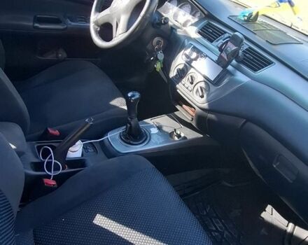 Синій Міцубісі Lancer, об'ємом двигуна 1.6 л та пробігом 267 тис. км за 3700 $, фото 10 на Automoto.ua