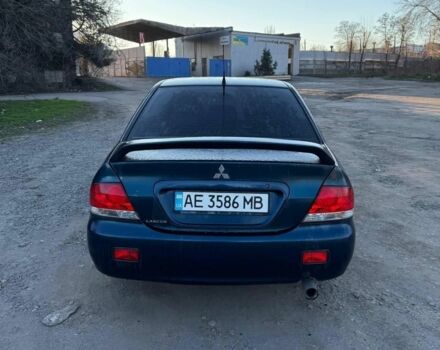 Синий Мицубиси Лансер, объемом двигателя 1.6 л и пробегом 330 тыс. км за 3999 $, фото 4 на Automoto.ua