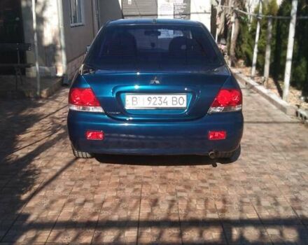 Синий Мицубиси Лансер, объемом двигателя 1.58 л и пробегом 195 тыс. км за 3990 $, фото 5 на Automoto.ua