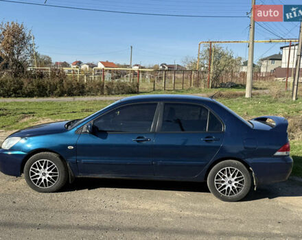 Синій Міцубісі Lancer, об'ємом двигуна 1.58 л та пробігом 269 тис. км за 3350 $, фото 4 на Automoto.ua