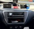 Синій Міцубісі Lancer, об'ємом двигуна 1.6 л та пробігом 159 тис. км за 4340 $, фото 16 на Automoto.ua