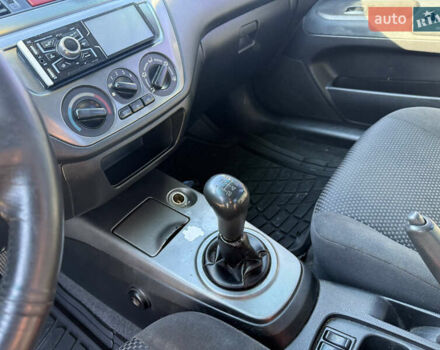 Синій Міцубісі Lancer, об'ємом двигуна 1.58 л та пробігом 269 тис. км за 3350 $, фото 13 на Automoto.ua