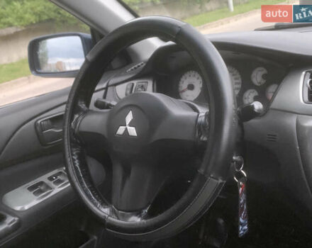 Мицубиси Лансер 2006 в Львове на Automoto.ua Синий Мицубиси Лансер, объемом двигателя 1.58 л и пробегом 420 тыс. км за 2900 $, фото 10 на Automoto.ua