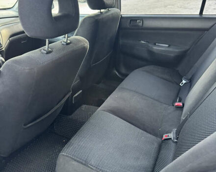 Синий Мицубиси Лансер, объемом двигателя 1.58 л и пробегом 244 тыс. км за 3300 $, фото 18 на Automoto.ua