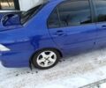 Синій Міцубісі Lancer, об'ємом двигуна 1.6 л та пробігом 300 тис. км за 3000 $, фото 3 на Automoto.ua