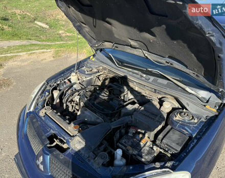 Синій Міцубісі Lancer, об'ємом двигуна 1.58 л та пробігом 269 тис. км за 3350 $, фото 28 на Automoto.ua