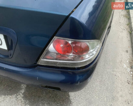 Мицубиси Лансер 2006 в Львове на Automoto.ua Синий Мицубиси Лансер, объемом двигателя 1.58 л и пробегом 420 тыс. км за 2900 $, фото 47 на Automoto.ua