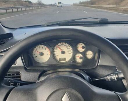 Синий Мицубиси Лансер, объемом двигателя 1.6 л и пробегом 360 тыс. км за 3000 $, фото 4 на Automoto.ua