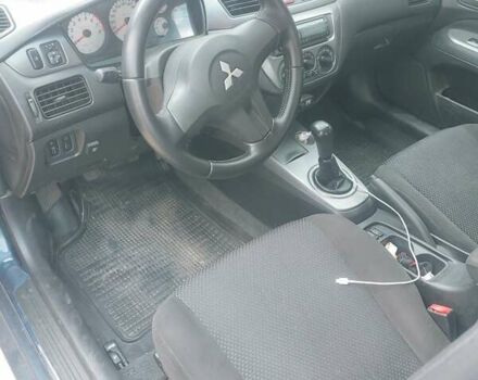 Синій Міцубісі Lancer, об'ємом двигуна 0 л та пробігом 243 тис. км за 5000 $, фото 2 на Automoto.ua