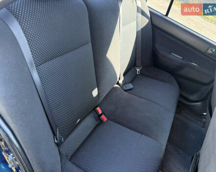 Синій Міцубісі Lancer, об'ємом двигуна 1.58 л та пробігом 269 тис. км за 3350 $, фото 21 на Automoto.ua