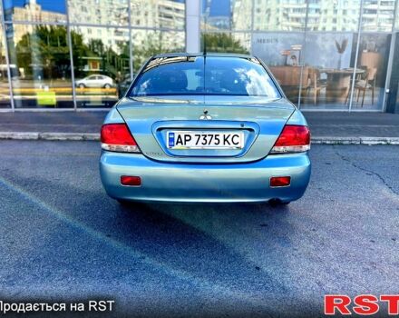 Синій Міцубісі Lancer, об'ємом двигуна 1.6 л та пробігом 273 тис. км за 3499 $, фото 2 на Automoto.ua