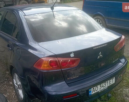 Синий Мицубиси Лансер, объемом двигателя 1.47 л и пробегом 172 тыс. км за 6350 $, фото 3 на Automoto.ua