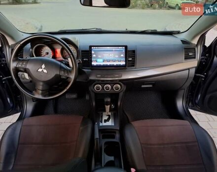 Синій Міцубісі Lancer, об'ємом двигуна 2 л та пробігом 234 тис. км за 6700 $, фото 17 на Automoto.ua