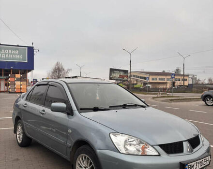 Синий Мицубиси Лансер, объемом двигателя 1.6 л и пробегом 238 тыс. км за 3500 $, фото 2 на Automoto.ua