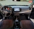 Синій Міцубісі Lancer, об'ємом двигуна 2 л та пробігом 234 тис. км за 6700 $, фото 17 на Automoto.ua