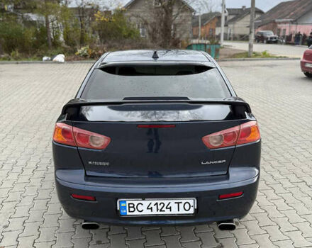 Синий Мицубиси Лансер, объемом двигателя 2 л и пробегом 326 тыс. км за 5650 $, фото 8 на Automoto.ua