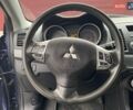 Синій Міцубісі Lancer, об'ємом двигуна 2 л та пробігом 210 тис. км за 6800 $, фото 25 на Automoto.ua