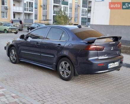 Синій Міцубісі Lancer, об'ємом двигуна 2 л та пробігом 234 тис. км за 6700 $, фото 3 на Automoto.ua