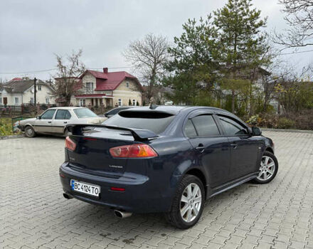 Синий Мицубиси Лансер, объемом двигателя 2 л и пробегом 326 тыс. км за 5650 $, фото 5 на Automoto.ua