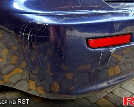 Синій Міцубісі Lancer, об'ємом двигуна 2 л та пробігом 248 тис. км за 5000 $, фото 2 на Automoto.ua