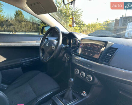 Синій Міцубісі Lancer, об'ємом двигуна 2 л та пробігом 240 тис. км за 6800 $, фото 4 на Automoto.ua