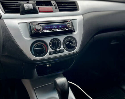 Синий Мицубиси Лансер, объемом двигателя 1.6 л и пробегом 185 тыс. км за 4950 $, фото 20 на Automoto.ua