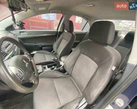 Синій Міцубісі Lancer, об'ємом двигуна 2 л та пробігом 210 тис. км за 6800 $, фото 18 на Automoto.ua