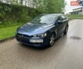Синий Мицубиси Лансер, объемом двигателя 2 л и пробегом 310 тыс. км за 4500 $, фото 1 на Automoto.ua