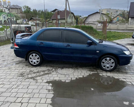 Синій Міцубісі Lancer, об'ємом двигуна 1.6 л та пробігом 245 тис. км за 3500 $, фото 3 на Automoto.ua