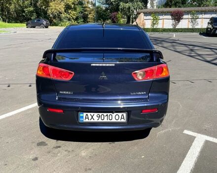 Синій Міцубісі Lancer, об'ємом двигуна 2 л та пробігом 300 тис. км за 5850 $, фото 5 на Automoto.ua