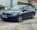Синій Міцубісі Lancer, об'ємом двигуна 2 л та пробігом 217 тис. км за 4100 $, фото 1 на Automoto.ua