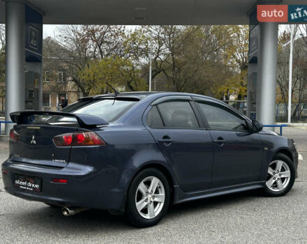 Синій Міцубісі Lancer, об'ємом двигуна 2 л та пробігом 222 тис. км за 5999 $, фото 2 на Automoto.ua