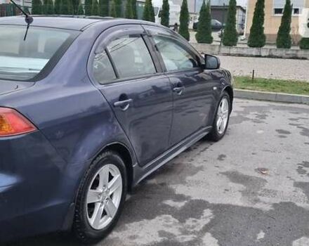 Синій Міцубісі Lancer, об'ємом двигуна 1.5 л та пробігом 206 тис. км за 5700 $, фото 9 на Automoto.ua