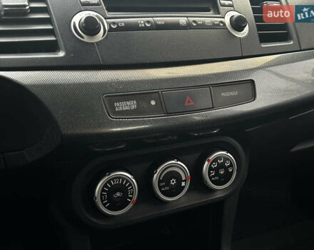 Синій Міцубісі Lancer, об'ємом двигуна 2 л та пробігом 222 тис. км за 5999 $, фото 11 на Automoto.ua
