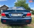Синий Мицубиси Лансер, объемом двигателя 1.58 л и пробегом 240 тыс. км за 3900 $, фото 1 на Automoto.ua