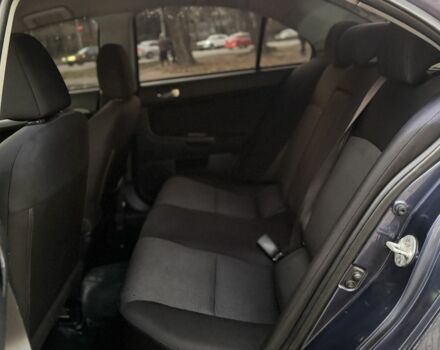 Синій Міцубісі Lancer, об'ємом двигуна 2 л та пробігом 189 тис. км за 7350 $, фото 13 на Automoto.ua