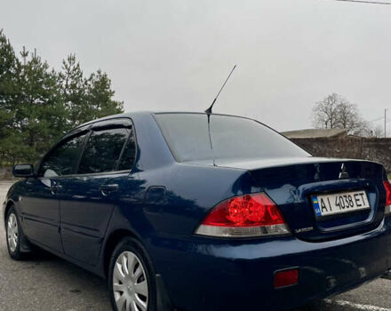 Синий Мицубиси Лансер, объемом двигателя 1.6 л и пробегом 184 тыс. км за 4950 $, фото 7 на Automoto.ua