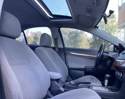 Синій Міцубісі Lancer, об'ємом двигуна 1.5 л та пробігом 198 тис. км за 4800 $, фото 15 на Automoto.ua