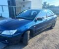Синій Міцубісі Lancer, об'ємом двигуна 1 л та пробігом 111 тис. км за 3100 $, фото 4 на Automoto.ua